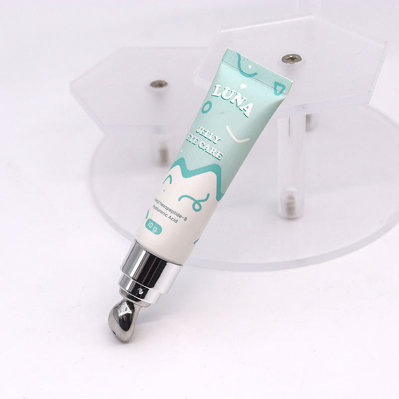 أنبوب كريم عين لطيف وفريد ​​من نوعه مع قضيب من سبائك الزنك لتغليف مستحضرات التجميل البلاستيكية 10 مللي-30 مللي أنبوب تدليك بلاستيكي للعناية بالعين