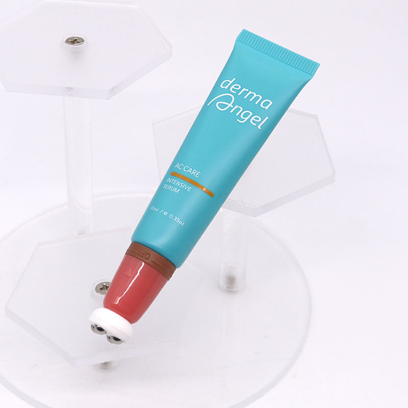 OEM 10ml-25ml PE أنابيب ضغط بلاستيكية 4 كرة دوارة ملمع الشفاه التعبئة والتغليف مع مفتاح تشغيل / إيقاف الرأس لتدليك كريم مصل العين